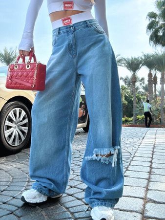 Jeansy z dziurą - Ciemny Jeans