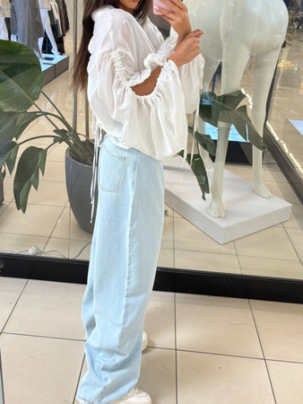 Jeansy z dziurą - Jasny Jeans