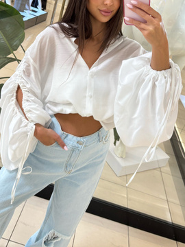 Jeansy z dziurą - Jasny Jeans